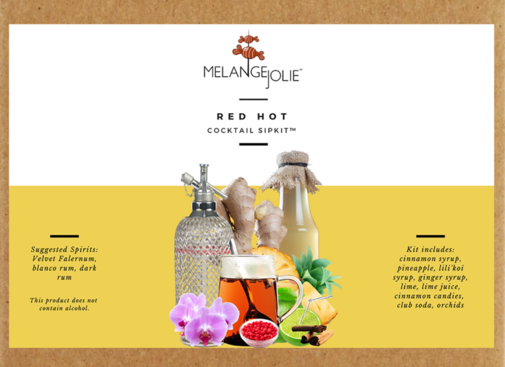 Mélange Jolie Red Hot Cocktail SipKit™ featuring vibrant ingredients and elegant coupe glass, perfect for cocktail enthusiasts.